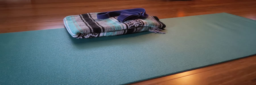 A yoga mat on the floor